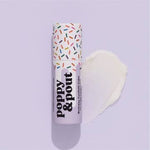 A tube of Poppy & Pout Lip Balm in "Birthday Cake" with a smear of balm beside it is displayed on a light purple background.