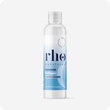 A clear bottle of Rho Nutrition Liposomal Collagen Peptides, labeled with a blue and white design, is set against a plain light gray background, emphasizing its marine collagen peptides that support joint health.