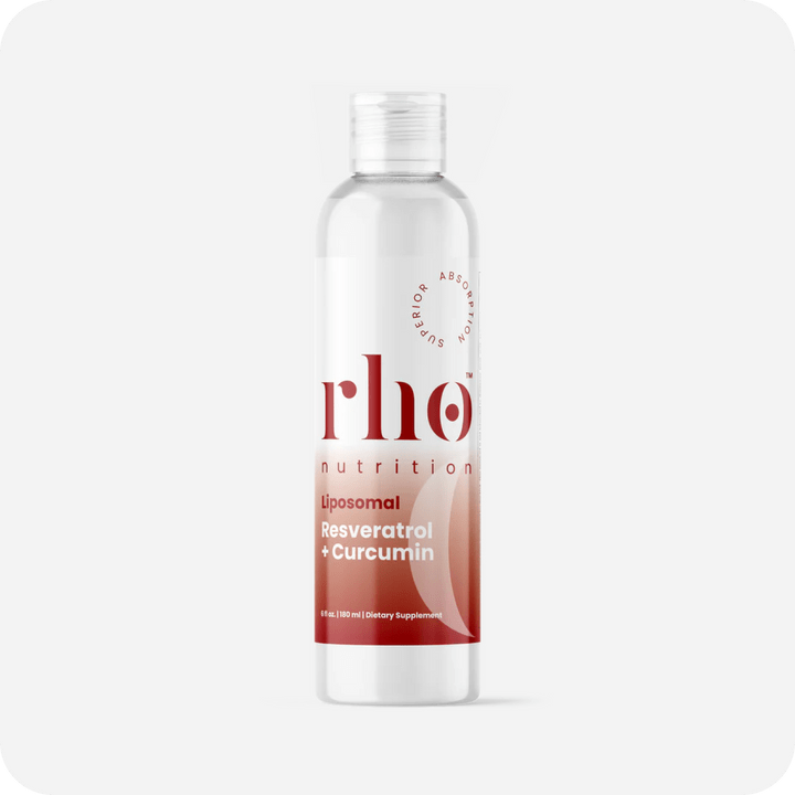 A clear plastic bottle labeled "Liposomal Curcumin + Resveratrol | Rho Nutrition," featuring a white cap and a red gradient design on the lower half, supports joint comfort with turmeric root extract.