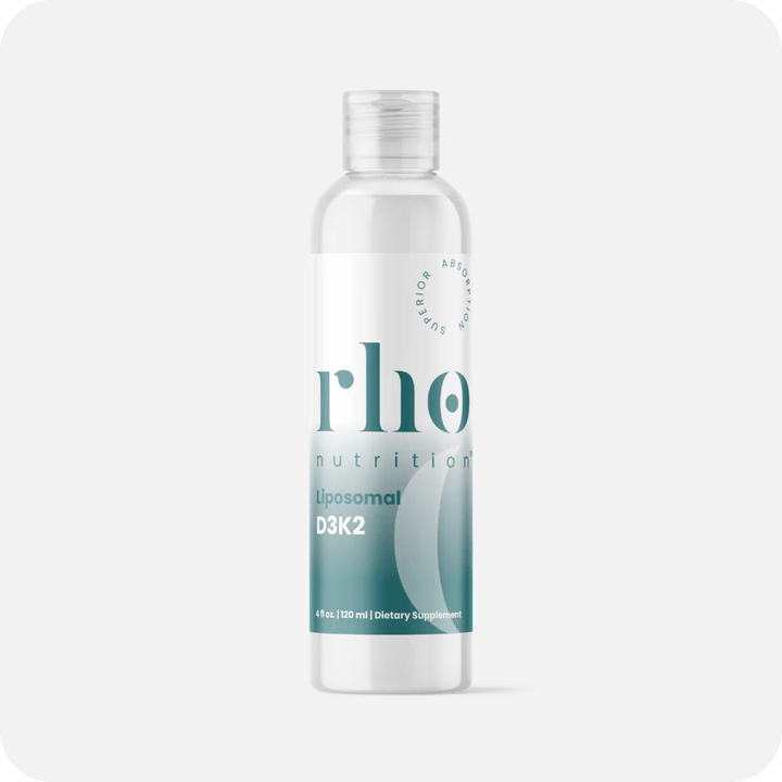 A clear plastic bottle labeled "Liposomal D3K2 | Rho Nutrition, 4 fl oz (120 ml) Dietary Supplement" on a white background, formulated to support bone health and the immune system.