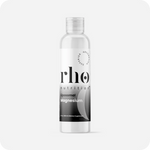 A clear bottle labeled "Liposomal Magnesium | Rho Nutrition," a dietary supplement for muscle recovery and nervous system support by Rho Nutrition, is displayed against a plain white background.