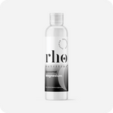 A clear bottle labeled "Liposomal Magnesium | Rho Nutrition," a dietary supplement for muscle recovery and nervous system support by Rho Nutrition, is displayed against a plain white background.
