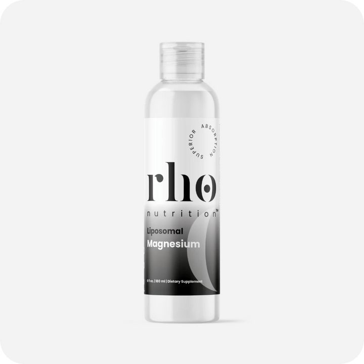 A clear bottle labeled "Liposomal Magnesium | Rho Nutrition," a dietary supplement for muscle recovery and nervous system support by Rho Nutrition, is displayed against a plain white background.