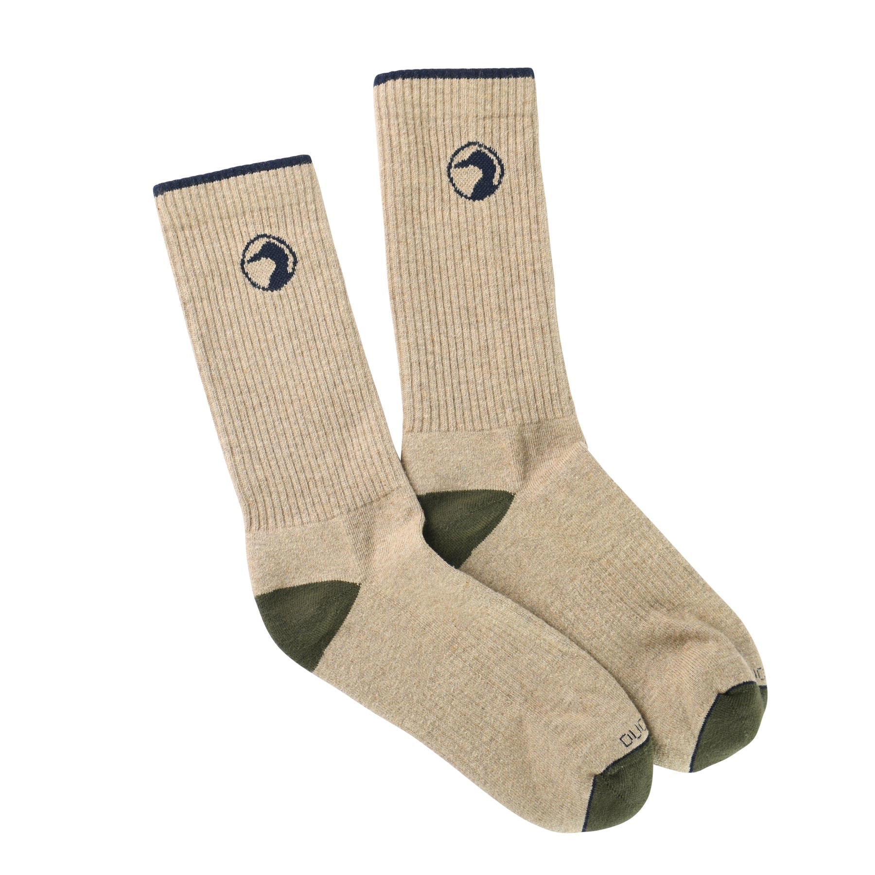 The Duck Head Logo Sock is a beige crew style with green toes and heels, featuring a dark circular logo near the top. Classic design, made in the USA.