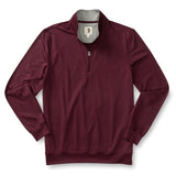 The Duck Head Long Drive Performance 1/4 Zip Pullover is a maroon long-sleeve with a standing collar, visible zipper, and inner logo tag—ideal golf apparel with moisture-wicking comfort on the course.