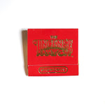 A red packet labeled "Matches | The Incense Match" by The Incense Match, featuring "strawberry" in gold text, is shown on a white background—an ideal incense gift or portable air freshener solution.