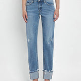 Someone styles the Vervet Mid Rise Cuffed Straight Jean—a light blue comfort stretch denim with frayed cuffs and slight distressing—with a white top and open-toe heels.