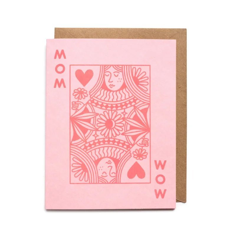 The Mom Queen Mother's Day Card by Worthwhile Paper features a pink queen playing card design with "MOM" and "WOW" written vertically, and comes with a brown envelope.