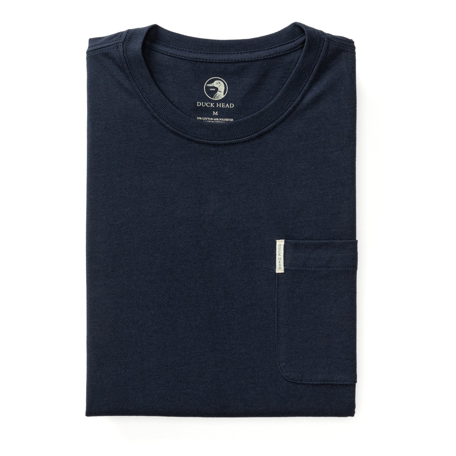 The Navy Lounge Set by Duck Head features a neatly folded dark blue cotton tee with a chest pocket and visible brand label inside the collar—ideal for pairing with flannel pants or as part of a stylish gift set.
