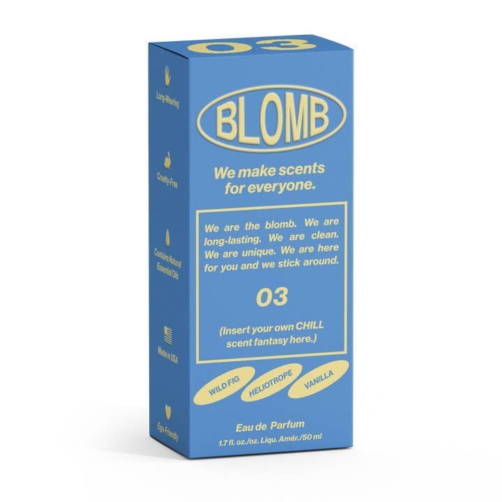 Blue and yellow box of Blomb No.03 Eau de Parfum, featuring Mediterranean fig, heliotrope, and vanilla notes, with text emphasizing the fragrance’s unique and inclusive character.