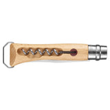 The Opinel No. 10 Corkscrew Stainless Steel Folding Knife with Bottle Opener features a beech wood handle, metal helix with cap, and a side groove to hold the helix securely.
