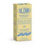 A yellow box labeled "No.31 Eau De Parfum | Blomb" with blue text highlights scent notes of mimosa, jasmine, and violet, along with messages about the fragrance's uniqueness and long-lasting effect.