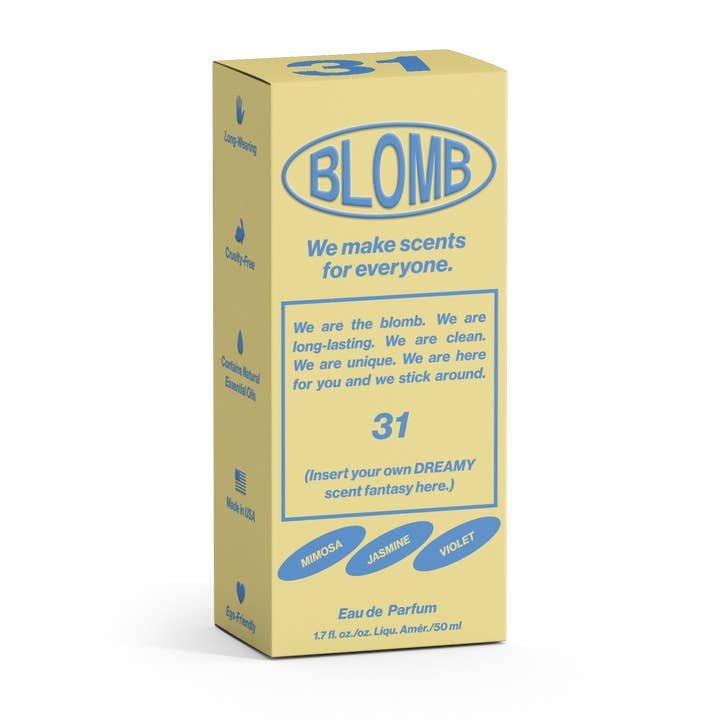 A yellow and blue "No.31 Eau De Parfum | Blomb" box features text about the Mimosa Jasmine scent, highlighting notes of mimosa, jasmine, and violet. This ultra feminine 1.7 fl. oz. fragrance comes in a stylish package by Blomb.