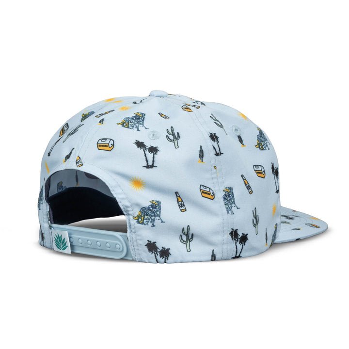 Rear view of the Oasis Hat by Sendero Provisions Co.: a light blue unstructured 5-panel snapback featuring an all-over print of cacti, coolers, palm trees, bottles, and suns.