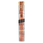 A clear tube with a cork top labeled "Old Fashioned Cocktail Cubes | Yes Cocktail Co." contains pink bitters-infused organic cane sugar cubes stacked inside.
