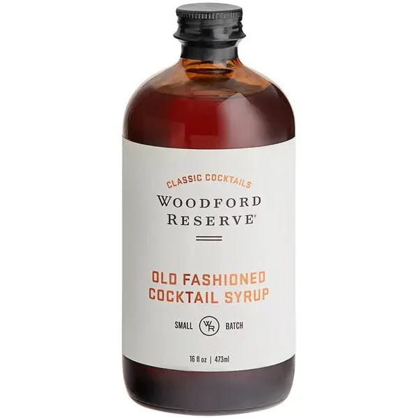 A 16 oz bottle of Old Fashioned Syrup by Bourbon Barrel Foods features a brown liquid, black cap, and classic cocktails label—ideal as a premium cocktail syrup for your favorite drinks.