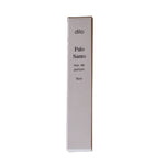 A rectangular white box labeled "Palo Santo Eau De Parfum | dilo" by dilo stands upright against a white background, featuring a fragrance inspired by Palo Santo.