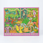Party Down by Birdie Puzzles is a 1000-piece puzzle featuring cartoon animals in vibrant outfits playing music and dancing in a lively forest, proudly made in the USA.