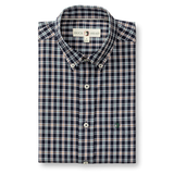 The Duck Head Performance Poplin Sport Shirt is a folded navy, white, and red plaid button-down with a collar, featuring a "Duck Head" label and a small embroidered chest logo.