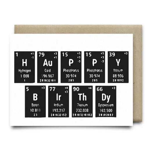 The Periodic Birthday A2 greeting card by Anvil Cards features "Happy Birthday" in periodic table symbols on sustainable linen paper and comes with a brown envelope.