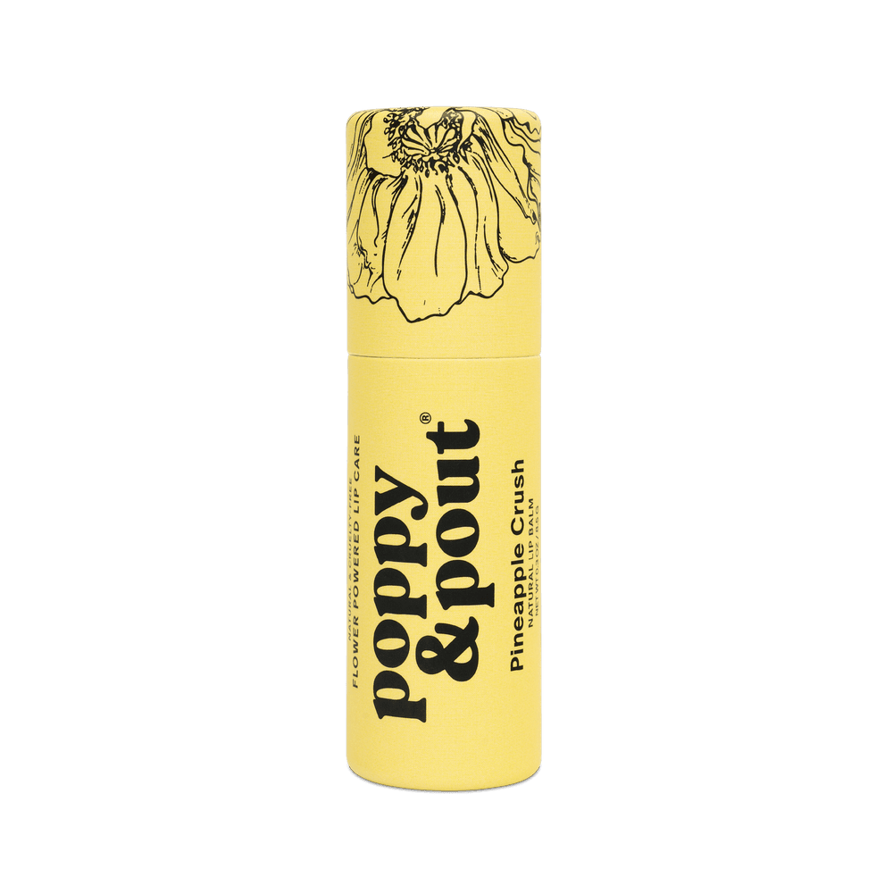 Poppy & Pout Lip Balm in a yellow cylindrical tube with floral top; hand-poured, natural, and cruelty-free for soft lips.