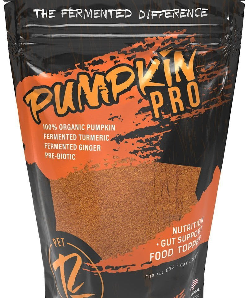 Pumpkin Pro by Rogue Pet Feed is a pet food topper with fermented pumpkin, turmeric, and ginger, providing gut support and nutrition for dogs and cats as an organic supplement.