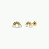 JaxKelly Rainbow Enamel Flat Stud Earrings feature colorful rainbow arcs with white clouds, crafted from hypoallergenic surgical grade stainless steel—perfect for kids' sensitive ears. Displayed on a plain light background.