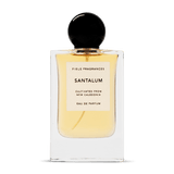 Santalum by Fiele Fragrance is a cruelty-free Eau de Parfum in a clear glass bottle with a black round cap and beige label, featuring a natural sandalwood scent.