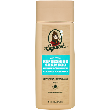 A beige Dr.Squatch Shampoo in the Coconut Castaway scent with toasted coconut, featuring a cartoon sasquatch on the label.