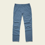 The Shoalwater Tech Pants by Howler Brothers are blue, straight-leg amphibious pants with zippered pockets, shown flat on a light background.