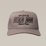 The Ballad of the Bird Dog Shop Hat | Arizona to Texas is a gray trucker hat with black embroidered "Ballad of the Bird Dog Arizona-Texas" text on the front, shown on a plain beige background.