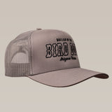 The Ballad of the Bird Dog Shop Hat features a gray front, mesh back, and "Arizona to Texas" embroidered in black.