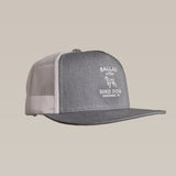 The Shop Hat | Bird Dog Classic Shop by Ballad of the Bird Dog features a gray and white mesh design, the "BALLAD of the BIRD DOG BRENHAM, TX" logo, and an embroidered dog graphic on the front panel.