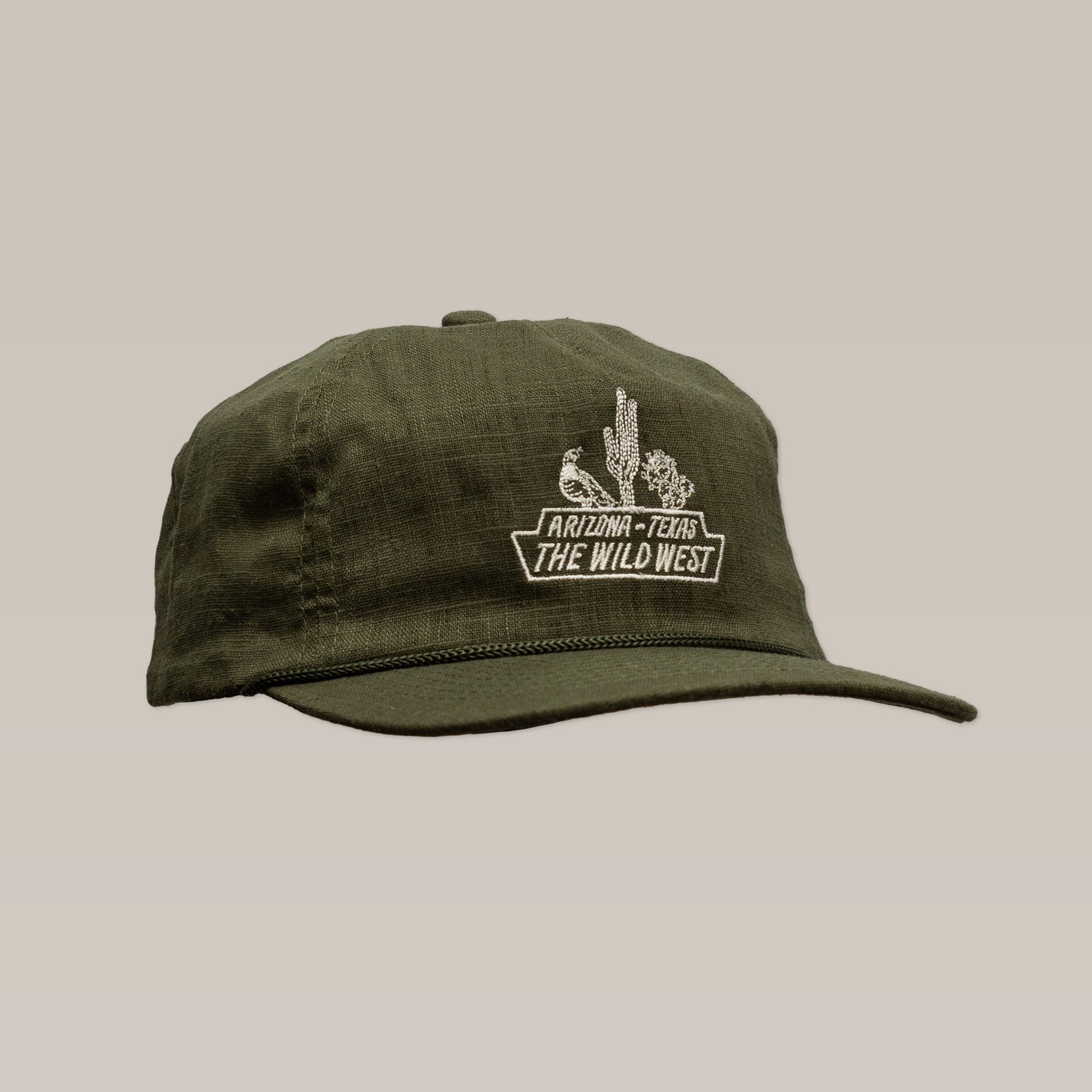 The Ballad of the Bird Dog Shop Hat | The Wild West features an olive green design with embroidered cactus, bird, and "Arizona - Texas The Wild West" on the front—part of our Desert Series Collection.