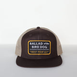The Shop Hat | Trust Your Gut Vintage Slate by Ballad of the Bird Dog features a rectangular front patch reading "TRUST YOUR GUT," making it a standout addition to any hat collection.