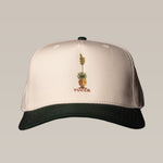 The Shop Hat | Yucca by Ballad of the Bird Dog features a cream and black design with an embroidered yucca plant and "YUCCA" on the front—a stylish pick from their Cactus Series for casual wear.