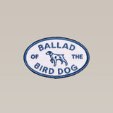 The Shop Patch | Bird Dog Emblem by Ballad of the Bird Dog features an embroidered dog illustration and "BALLAD OF THE BIRD DOG" text on a light background, inspired by the iconic emblem from a local Brenham business.
