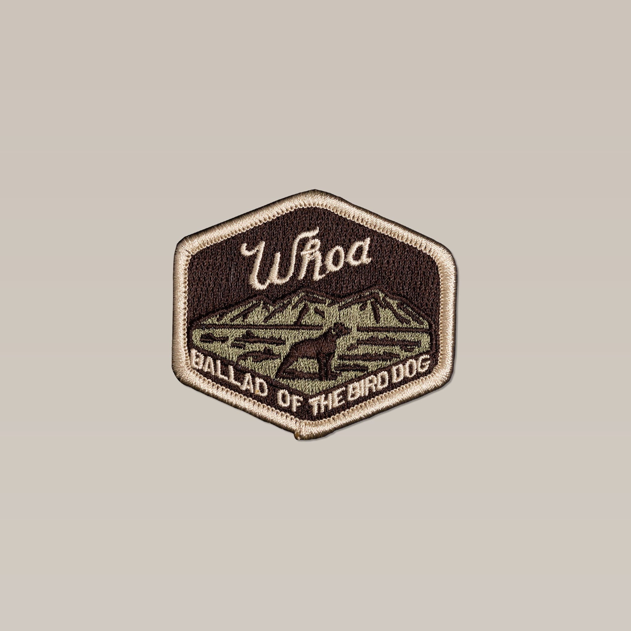The Shop Patch | Whoa | Ballad of the Bird Dog by Ballad of the Bird Dog features a mountain, field scene, and dog silhouette—ideal for bird hunting fans.