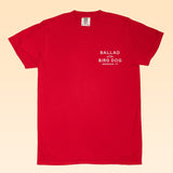 Ballad of the Bird Dog Shop Shirt: Red short-sleeve tee featuring the Classic Shop Logo, "BALLAD of the BIRD DOG BRENHAM, TX," printed in white on the upper left chest.