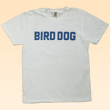 The Shop Shirt | Bird Dog Honor by Ballad of the Bird Dog features bold blue "BIRD DOG" lettering—ideal for fans of classic hunting dog style.