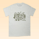 The Shop Shirt | Desert Hunt by Ballad of the Bird Dog features a line art print of a person throwing a ball to a dog in the desert with mountains, cacti, and "Ballad of the Bird Dog" text—ideal for outdoor desert adventures.