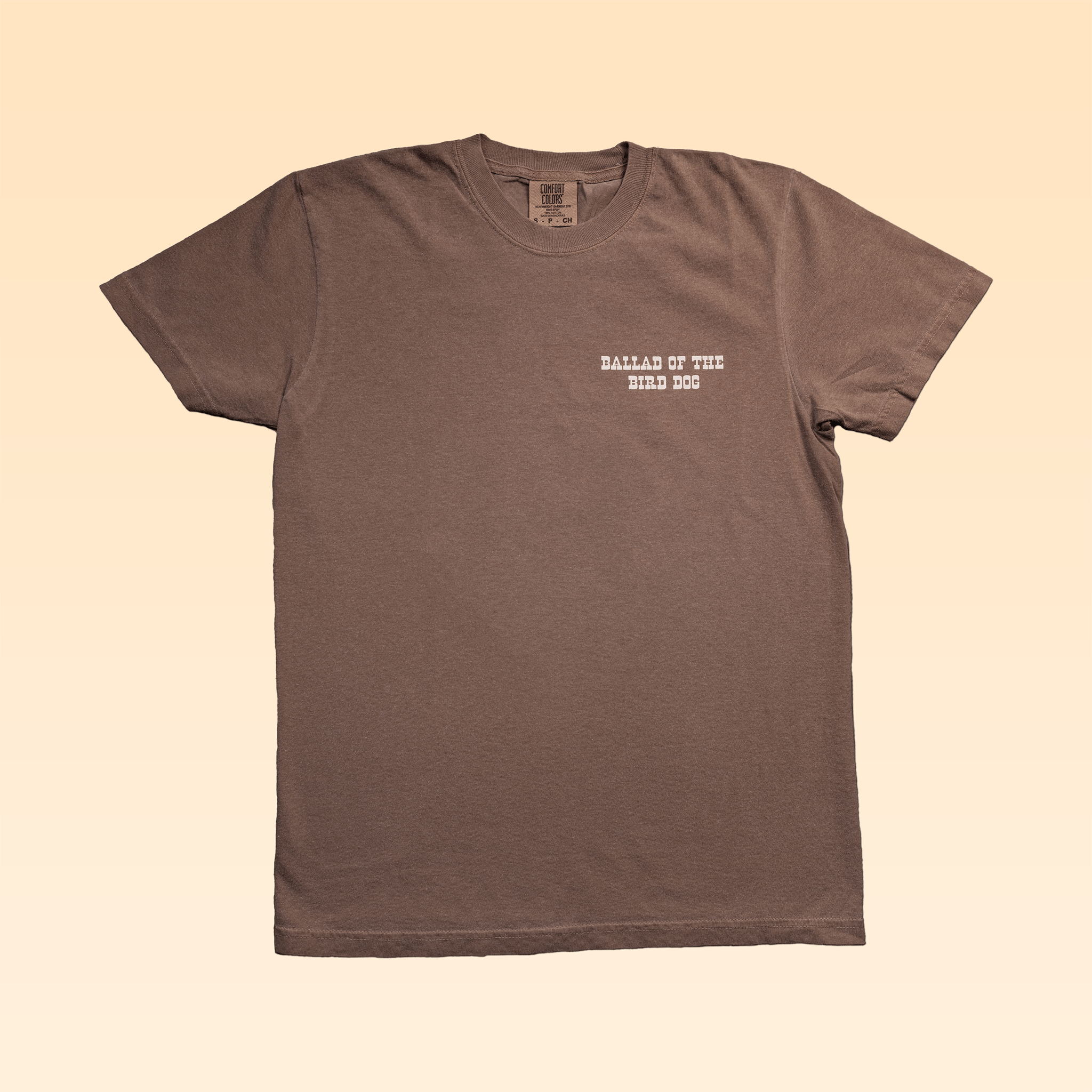 The Ballad of the Bird Dog Shop Shirt | Old Fashioned features “BALLAD OF THE BIRD DOG” in white on the chest—a classic brown tee, ideal for fans of country western style.