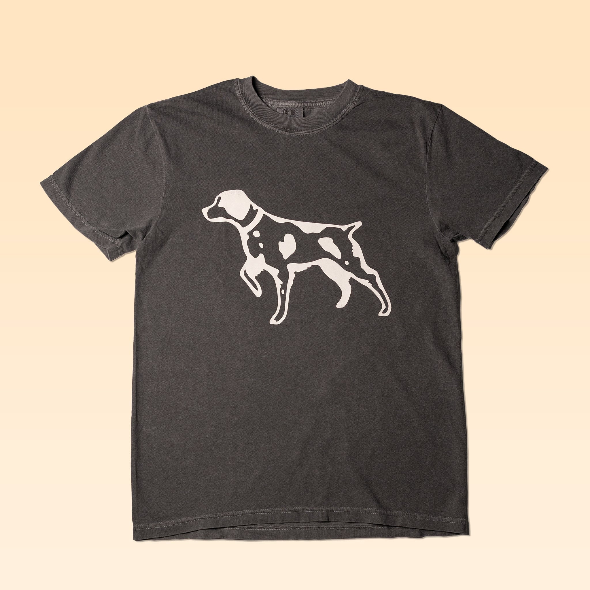 The Ballad of the Bird Dog Shop Shirt | Pointer features a dark gray design with a white outlined spotted dog, including a heart-shaped spot—perfect for fans of Ballad of the Bird Dog.