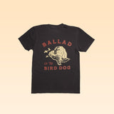 The Ballad of the Bird Dog Shop Shirt | Retriever features a black t-shirt with a dog’s head, two birds, and bold “BALLAD OF THE BIRD DOG” text on the back.