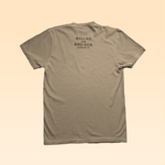Shop Shirt | Upland Morning by Ballad of the Bird Dog shown from the back with "BALLAD of the BIRD DOG BRENHAM, TX" in black near the top; handcrafted in Texas from 100% USA cotton.
