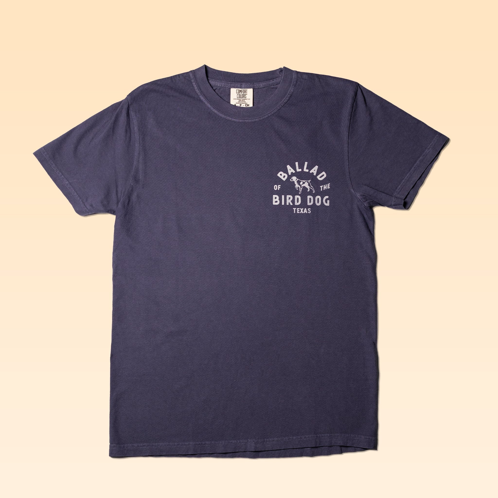 The Ballad of the Bird Dog Shop Shirt | Whoa is a plain dark gray tee with "Ballad of the Bird Dog Texas" text and a small dog graphic printed on the left chest.