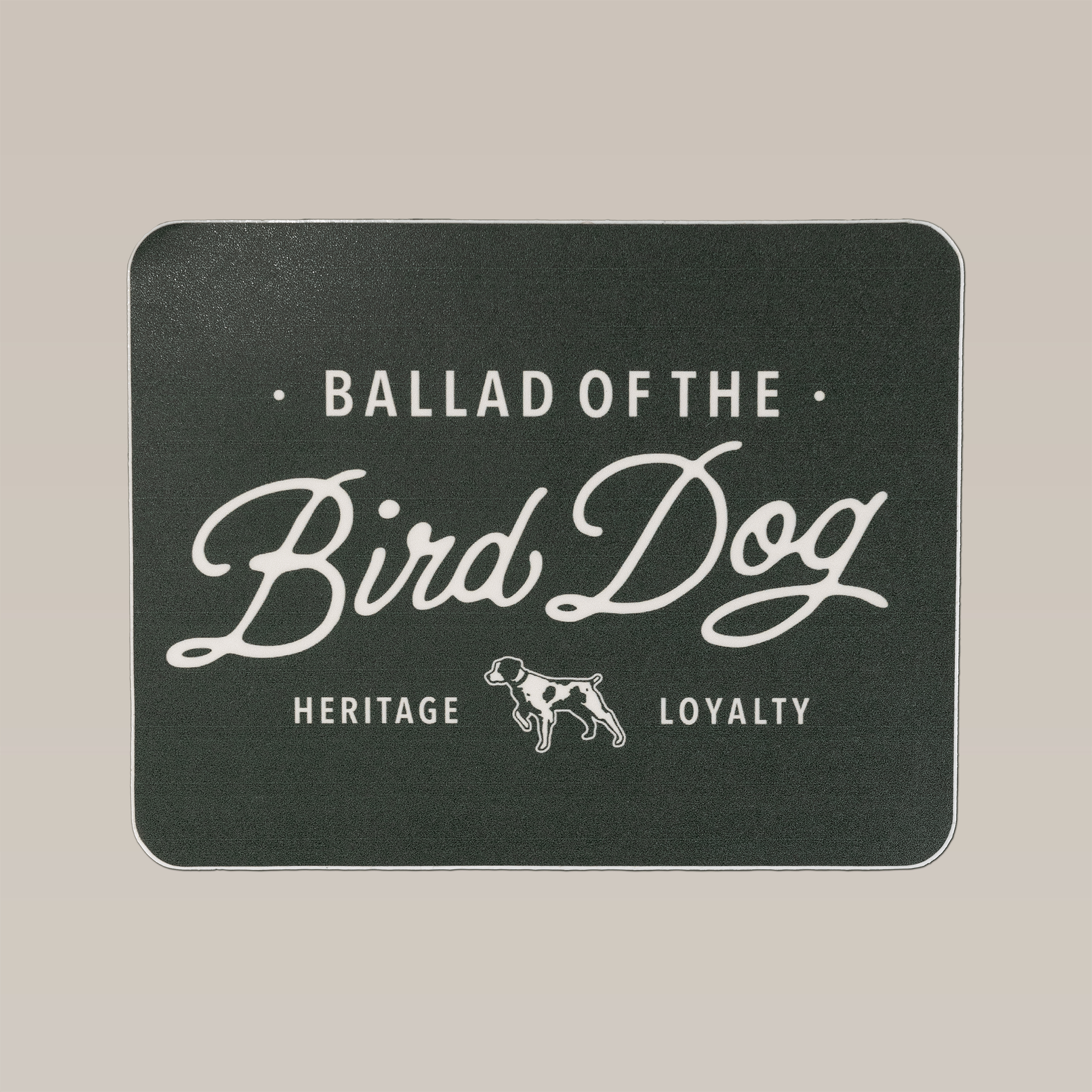 The Ballad of the Bird Dog Shop Sticker features "BALLAD OF THE BIRD DOG" above a small dog, with "HERITAGE" and "LOYALTY" below—ideal for bird dog fans or as a hunting companion sticker.