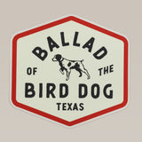 Hexagonal shop sticker by Ballad of the Bird Dog, named "Field Companion," features a red border, black and white dog illustration, and "Ballad of the Bird Dog Texas"—a unique design that celebrates brand loyalty.