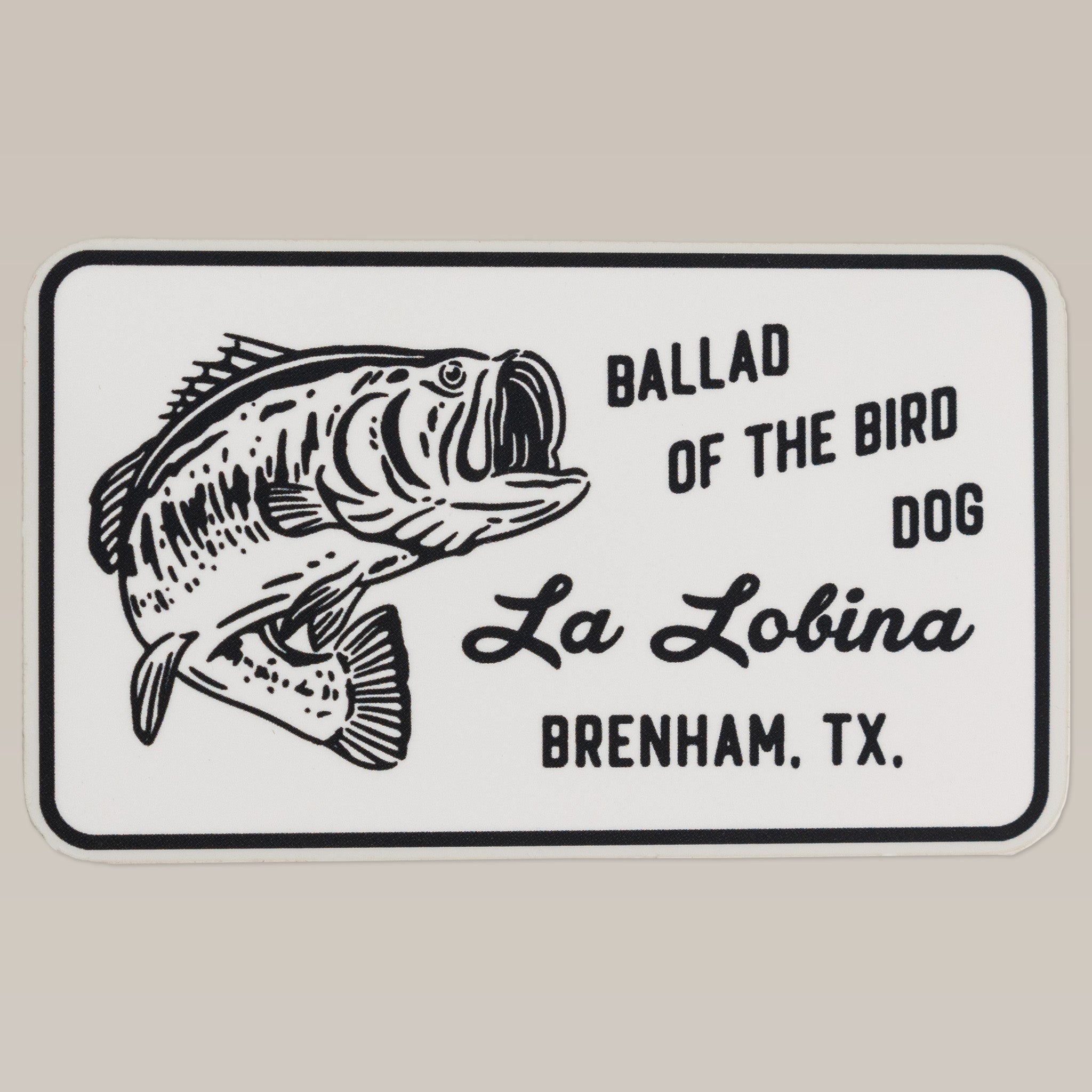 Shop Sticker | La Lobina by Ballad of the Bird Dog features a black and white largemouth bass and "La Lobina Brenham, TX" text—ideal for fishing sticker enthusiasts and bass anglers.