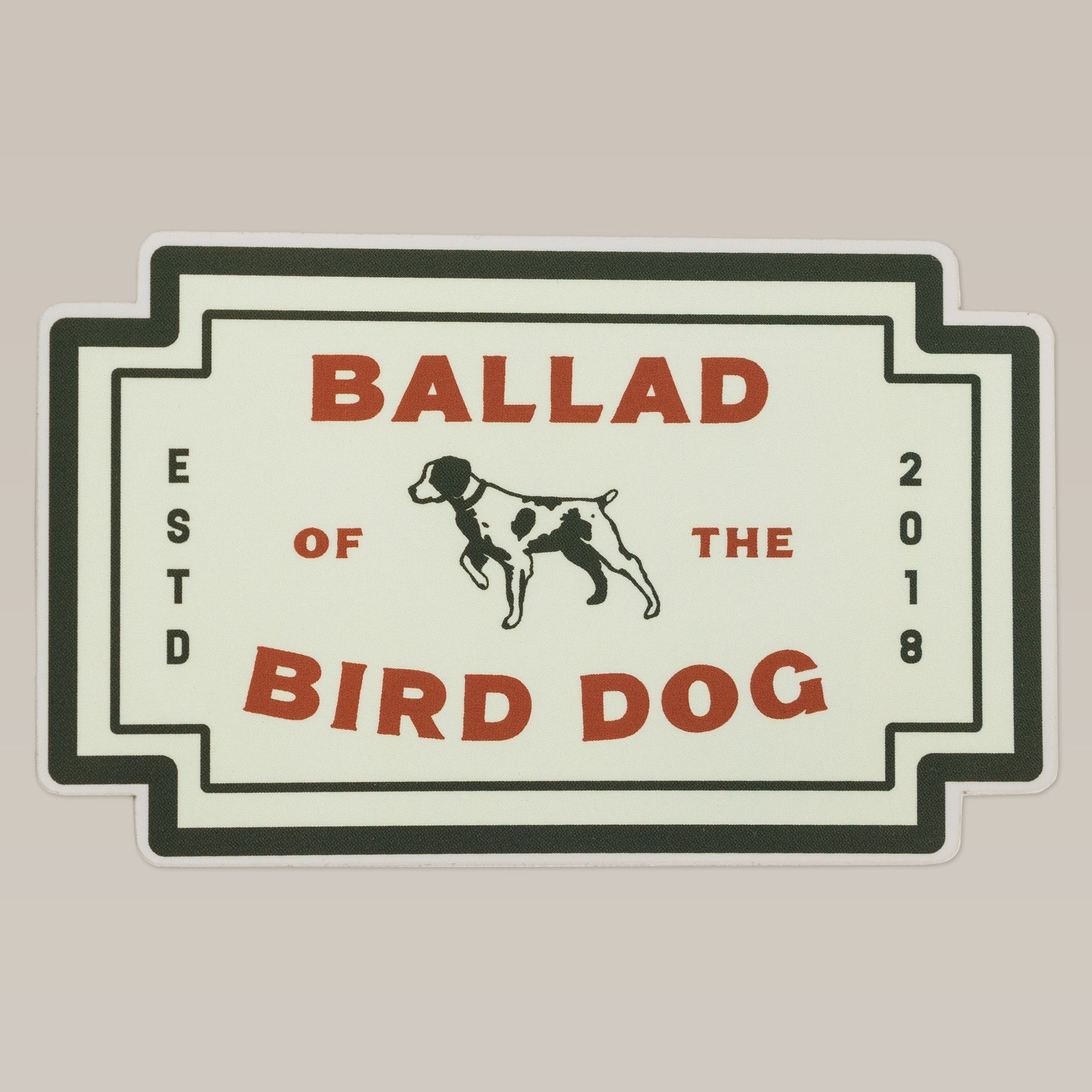 The "Shop Sticker | Neon Revival" by Ballad of the Bird Dog features a nostalgic emblem with a black and white dog and "ESTD 2018" printed vertically on each side.